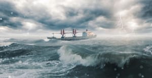 A container ship navigating turbulent waters, symbolizing how global supply chains are adapting to the challenges of extreme weather.