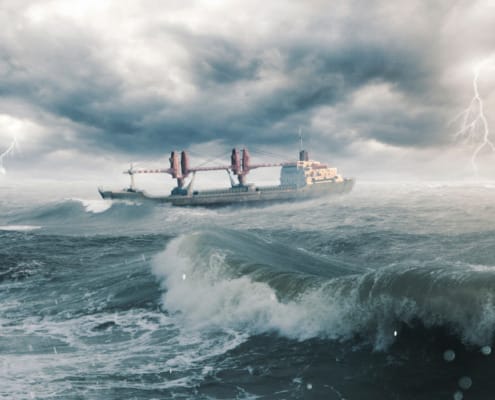 A container ship navigating turbulent waters, symbolizing how global supply chains are adapting to the challenges of extreme weather.