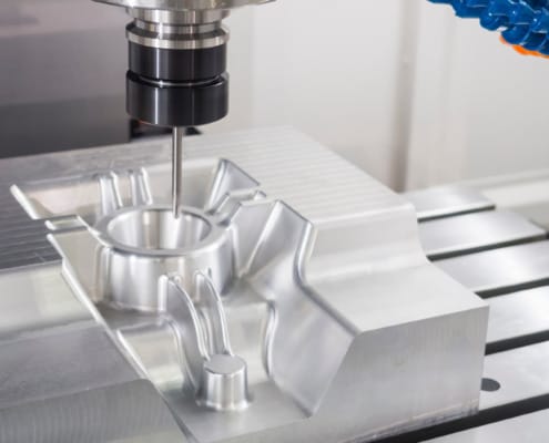 Precision injection molding equipment in modern manufacturing facility demonstrating tooling capability for offshore production.