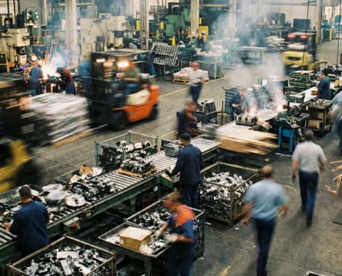 Factory floor representing contract manufacturing cost risks for PE-backed companies